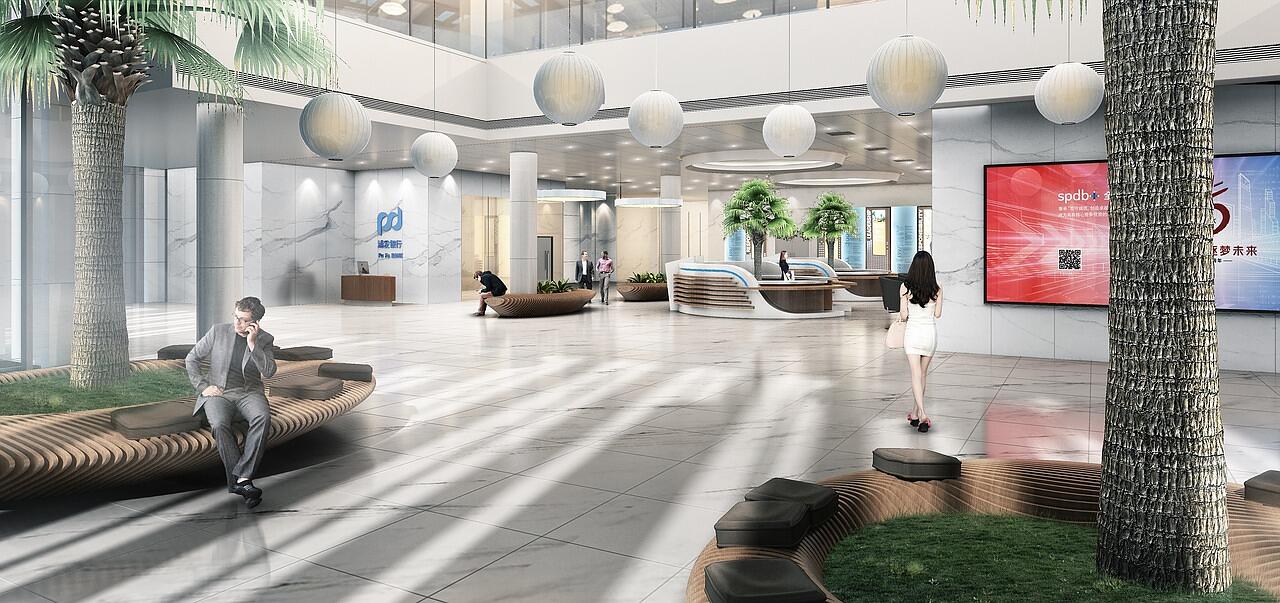 The lobby of a corporate office building filled with daylight