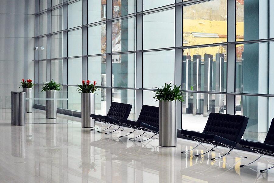 Lobby seating against a glass curtain wall