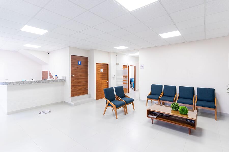 A medical office waiting area with seating
