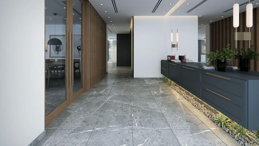 The corridor beyond a building reception desk